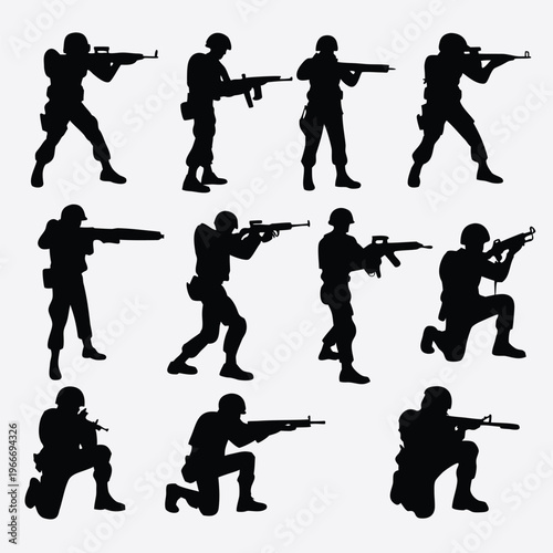 Collection of armed soldier silhouettes standing and kneeling in combat poses