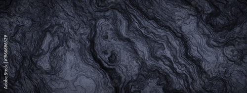 Abstract cooled volcanic lava background. Black basaltic rock surface