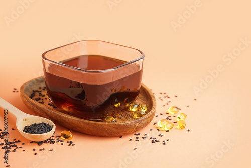 Bowl of oil and wooden spoo...