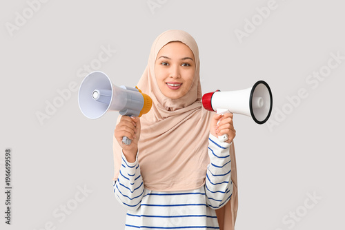 Young Asian Muslim woman wi...