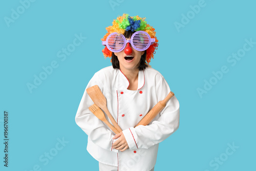 Funny young female chef wit...