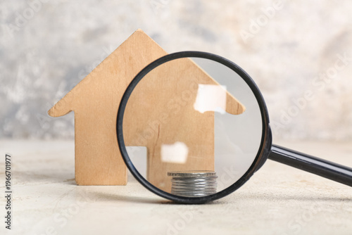 Wooden house figure, coins ...