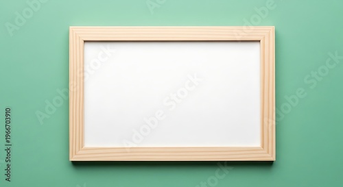 A simple, clean, wooden framed picture frame with a blank white canvas, perfect for displaying your cherished memories or artistic creations