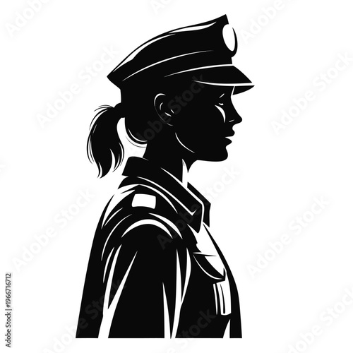 Profile view of a professional woman police officer in uniform and peaked service cap