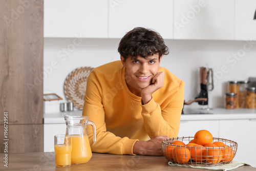 Young man with juice and or...