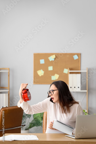 Stressed young businesswoma...