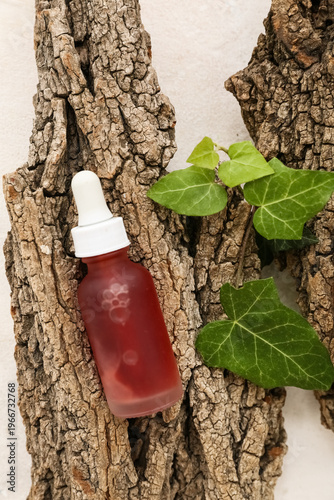 Bottle of cosmetic oil with...