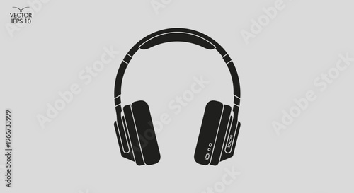 A sleek pair of black headphones on a gray background with white accents.