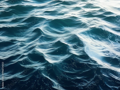 A tranquil depiction of ocean waves with a focus on the play of light and shadow.