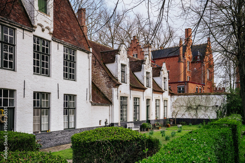 Картината върху платно Historic white houses and architecture in the Beguinage of Bruges, Belgium