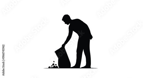 Man in black silhouette pouring objects from a bag on the ground outside
