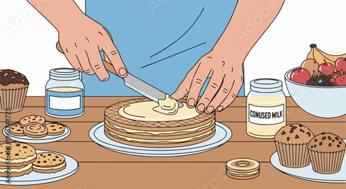 Hands frosting a layered waffle cake with cookies, muffins, and fruit nearby