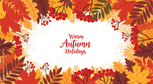 Festive autumn frame made of colorful maple oak leaves and rowan berries with warm holiday greetings in the center.