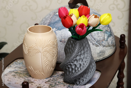 Two decorative vases made of plastic by layer-by-layer 3d printing