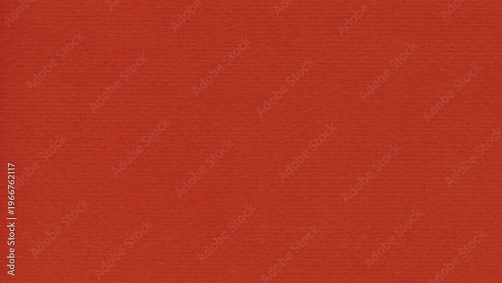 Fototapeta premium Red handmade paper texture with fibrous details and rough surface, ideal as decorative background or graphic design element.