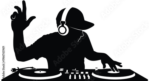 Silhouette of a disc jockey mixing music wearing headphones and raising an arm