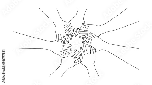 Diverse hands stacked together in unity.