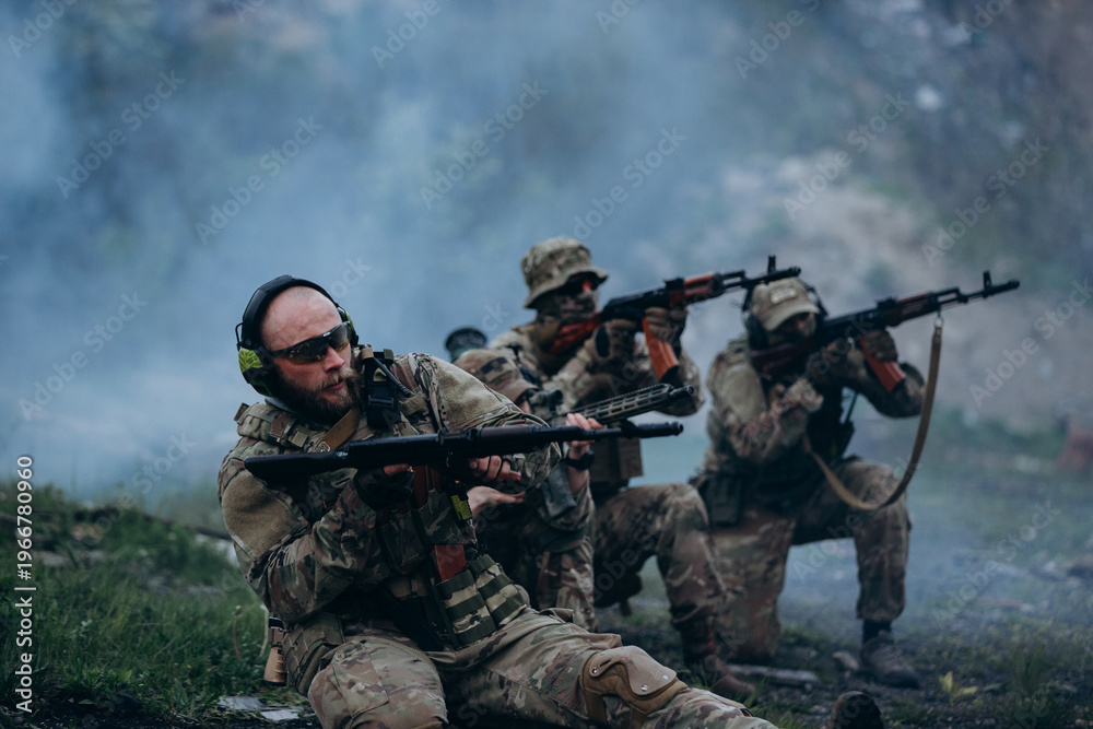 Fototapeta premium Ukrainian militarymen with their rifles at the range