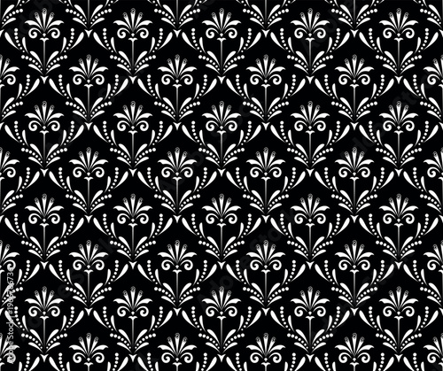 Floral pattern. Seamless vector background. Vintage wallpaper in the Baroque style. White and black ornament for fabric, wallpaper, packaging. Ornate Damask flower illustration.