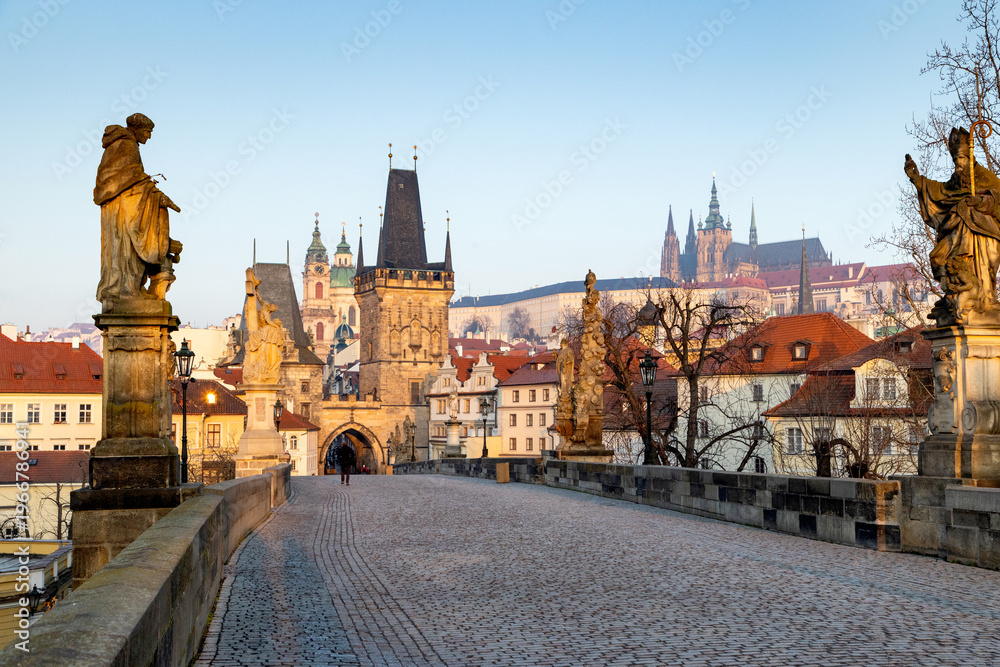Fototapeta premium charles Bridge in Prague Czech Republic at sunrise with historic statues