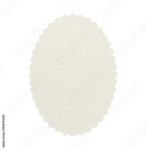 White scalloped oval paper label isolated. Stationery mockup and craft decoration.