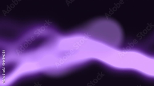 Abstract image of blurred purple shapes on a dark background