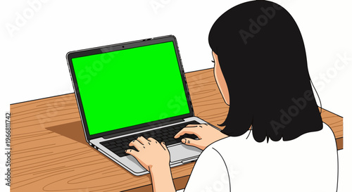 Person with black hair working on a laptop with a green screen on a wooden desk