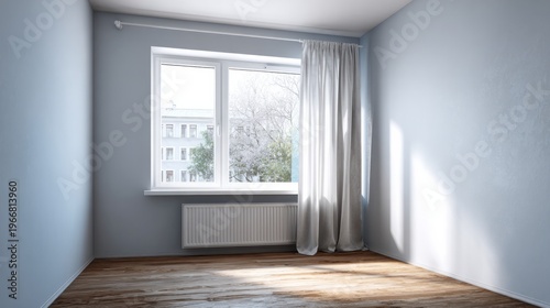 Empty room with light blue walls, wooden floor and window.