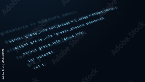 Focused computer source code on dark digital screen