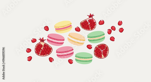 Colorful macarons and vibrant pomegranates scattered across a pale background