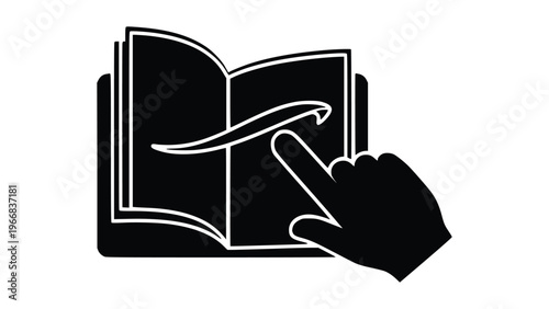 Hand swiping page of an open book with finger
