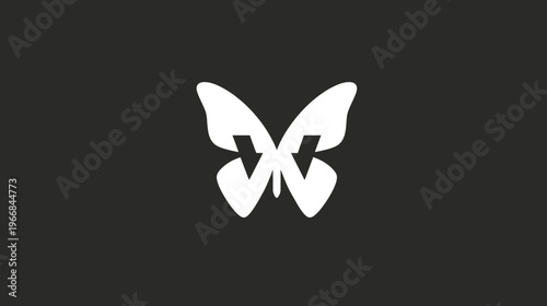 Minimalist white butterfly graphic formed by two mirrored 'W' letters on a dark background, elegant abstract design.
