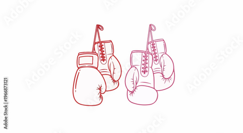 Two pairs of boxing gloves, one red, one pink, hang from strings