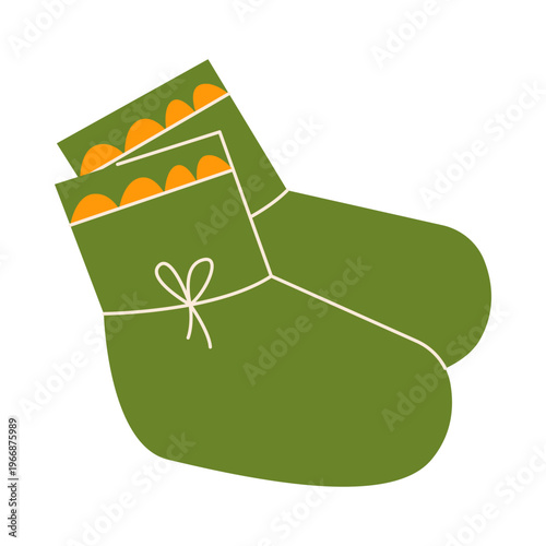 Pair of cute green baby booties with orange scallop trim and cream bows, colorful flat retro style. Cozy hand drawn vector illustration of infant footwear, baby shower. Isolated on white background.