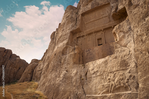 Ancient tomb carved in rock in Naqsh-e Rostam near Persepolis, Iran