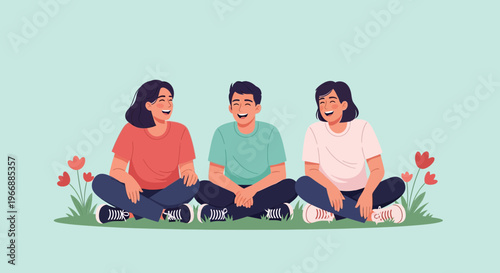 Three happy friends laughing together while sitting on grass outdoors