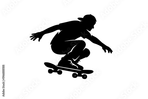 Silhouette of teen male skateboarder performing trick on skateboard