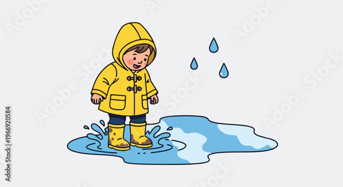 A happy child wearing a yellow raincoat and boots jumping into a water puddle