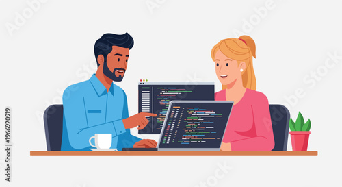 Two professionals collaborating on software development code on computer monitors