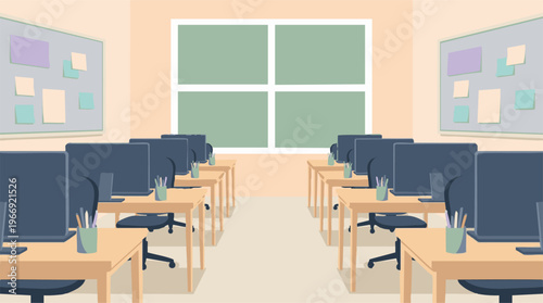 Empty computer lab classroom with desks, computers, and bulletin boards