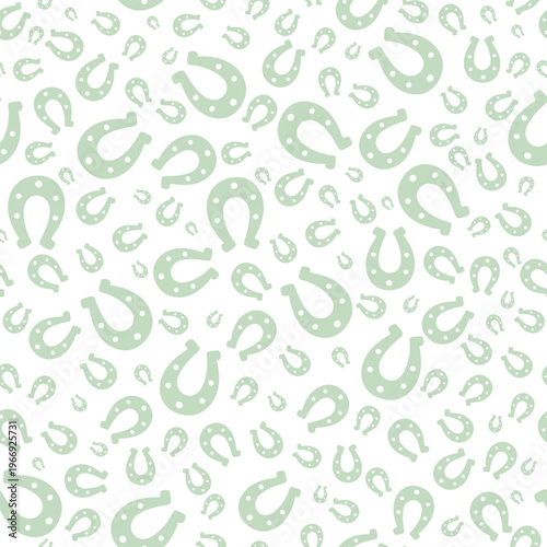 Pale green silhouette of a lucky horseshoe. Seamless vector pattern. Endless animal print.