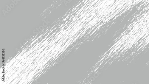 Abstract gray background with white streaks and scratches diagonally across the surface textured effect