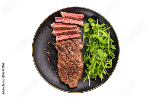 BBQ Grilled Striploin steak on a plate with salad, strip steak, prime roast beef meat isolated on white background