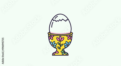 Cracked egg in a colorful floral egg cup