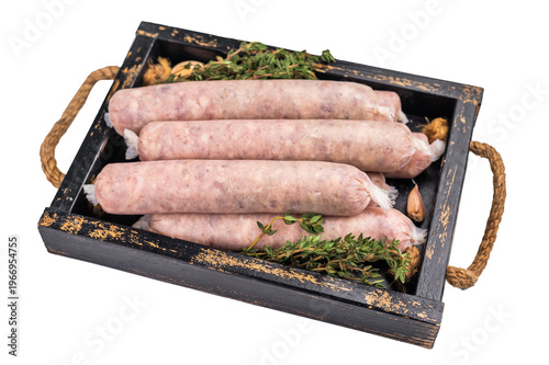 Raw Sausages with minced chicken and turkey meat with herbs in wooden tray isolated on white background. top view
