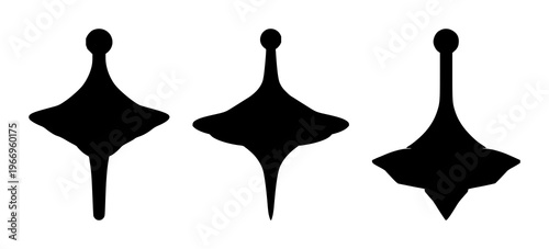 Spinning top set with stark black silhouette on white background featuring toy, spinning figure, top with motion and rotation