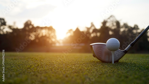 фотографія Golf clubs and golf balls on a green lawn in a beautiful golf course with morning sunshine