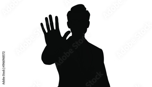 Silhouette of a man in a suit holding one hand up in a clear stop or halt gesture.