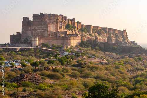 Mehrangarh Fort at the golden hour with the adjacent rocky landscape, Jodhpur, Rajasthan, India