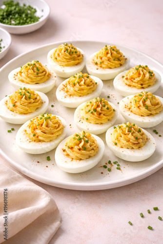 Deviled eggs with paprika and chives
